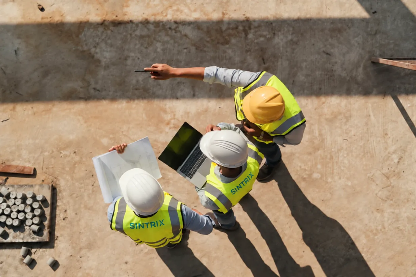 Engineers reviewing drawings on site